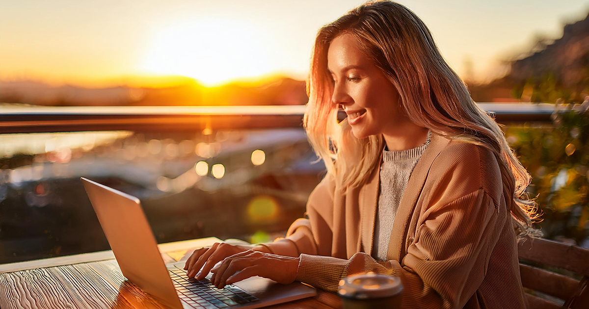 Charlotte working on her novel at sunset
